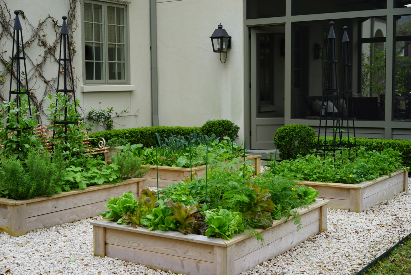 kitchen garden with four simple cedar beds