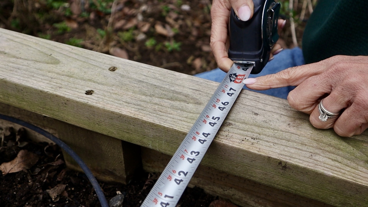 A measuring tape showing 48 inches