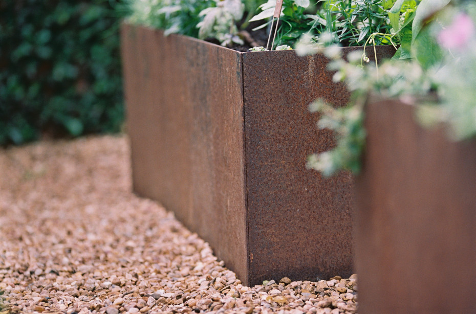 Closeup of Corten steel raised beds
