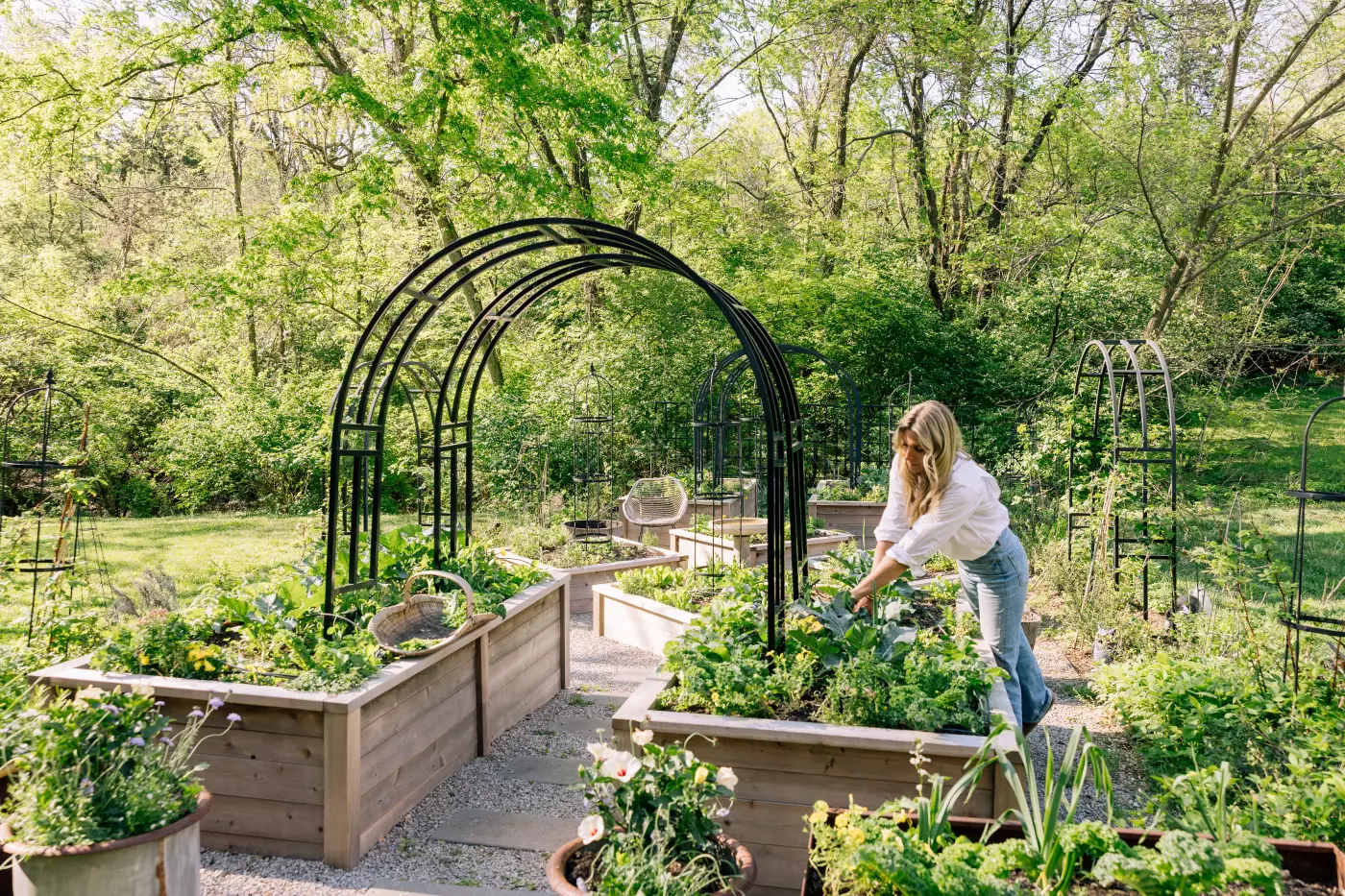 Nicole Burke working in her garden.