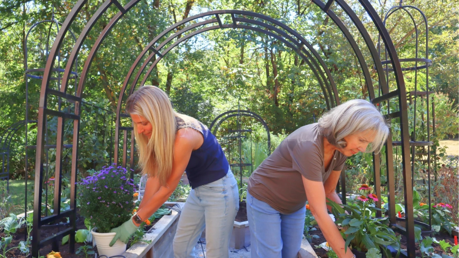 Nicole Burke and her mom working in the fall garden
