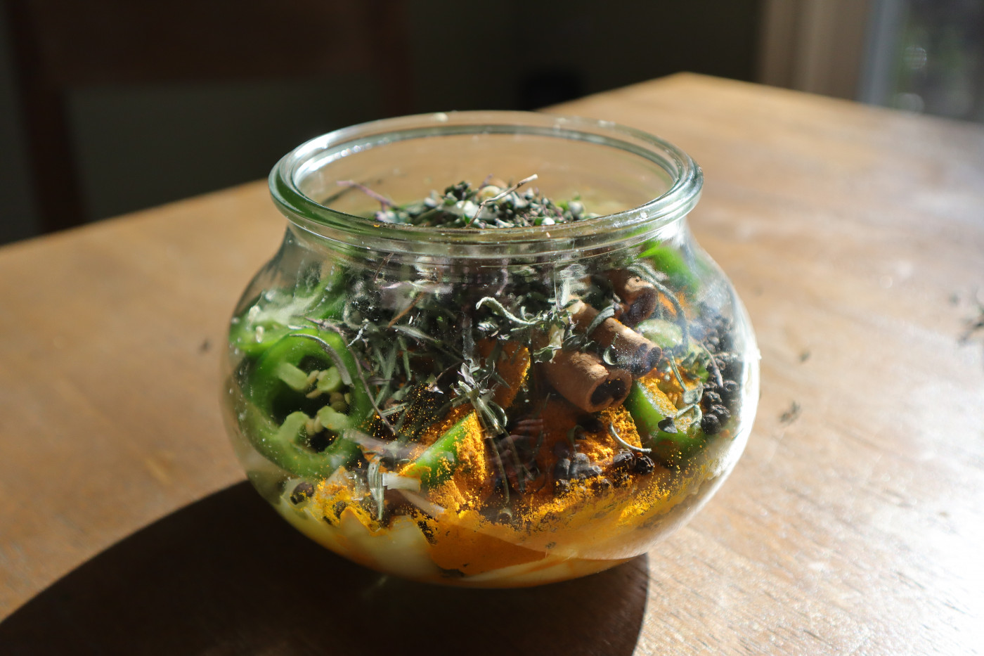 Ingredients in a fish bowl shaped glass