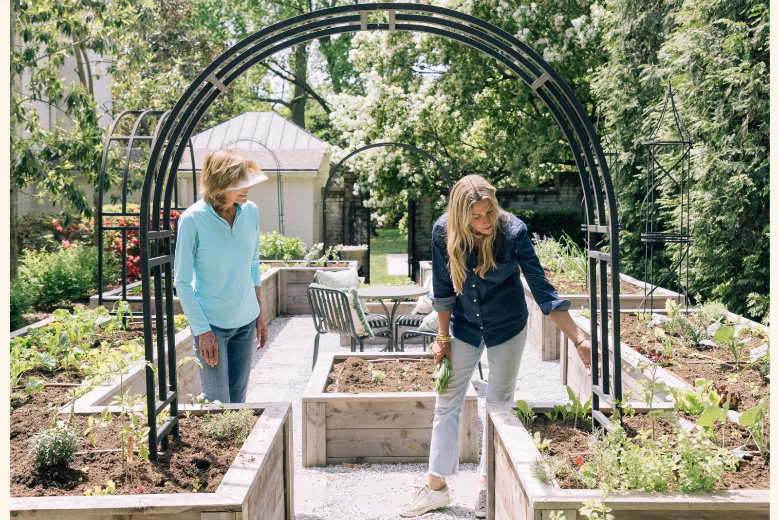 Nicole teaching a client how to garden.