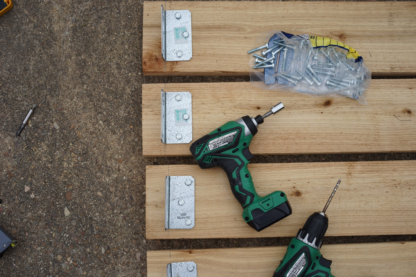 Wooden boards, a drill, and screws